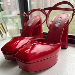 PRADA PATENT RED LEATHER PLATFORM HEELS.